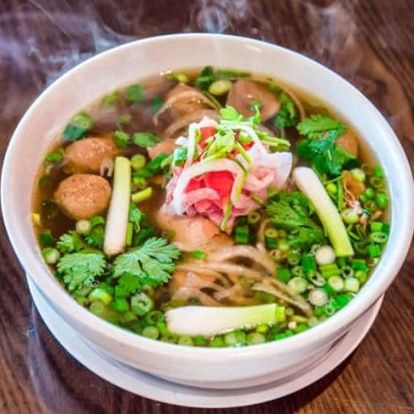 P6. Combination of eye round steak, well done brisket, meatball, tendon, tripe, meatballs (Pho đac biet)(Large)