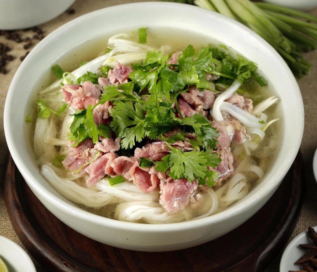 8.. Sliced Medium-Rare Steak Noodle Soup